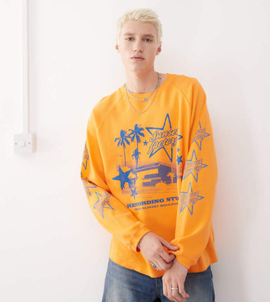 COLLUSION Long sleeve skater fit t-shirt in orange with blue print