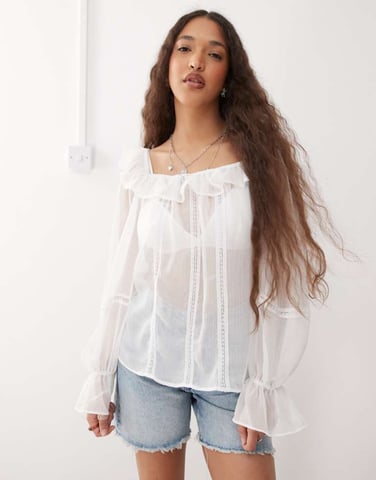 Reclaimed Vintage sheer square neck top with ruffles and lace trim in white