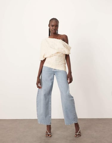ARRANGE draped off shoulder top in texture in cream