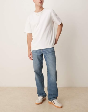 ASOS DESIGN baggy fit jeans in mid wash blue
