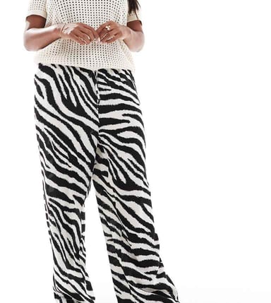 Vero Moda Curve Easy tie waist wide leg trousers in zebra print