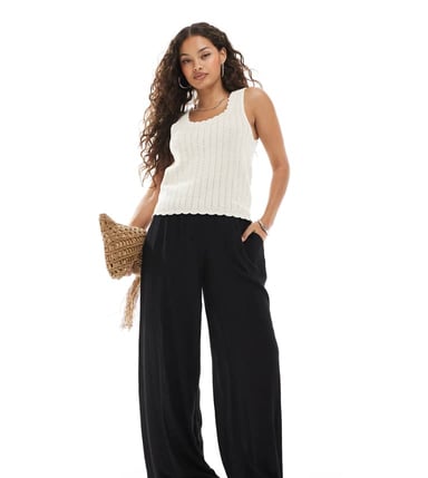 Vero Moda Petite high waisted floaty wide leg trousers in black