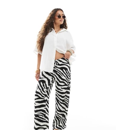 Vero Moda Petite Easy tie waist wide leg trousers in zebra print