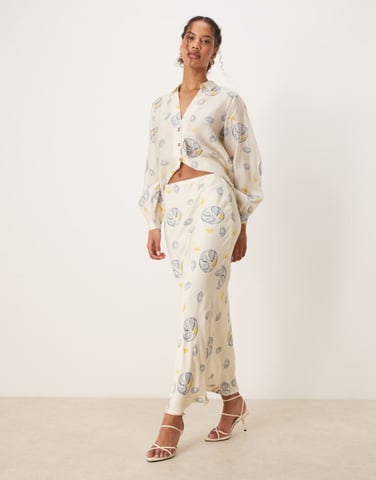 Never Fully Dressed satin slip maxi skirt co-ord in oyster lemon print