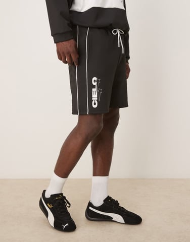 ASOS DESIGN oversized scuba-style fabric shorts with print in black co ord