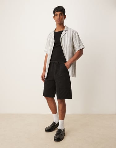 ASOS DESIGN long length pull on cargo shorts in black