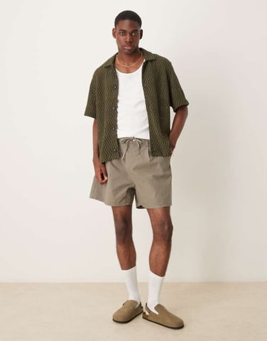 ASOS DESIGN wide shorter length shorts in khaki with pleats and drawstring