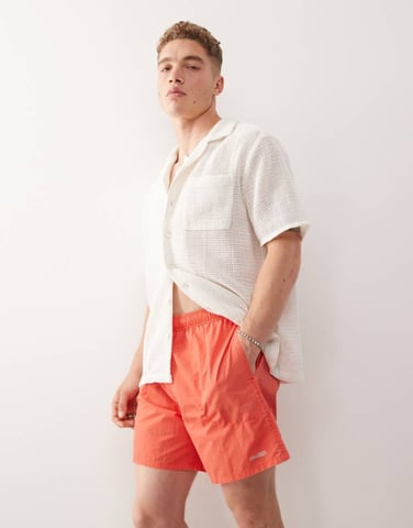 COLLUSION swim short in washed orange