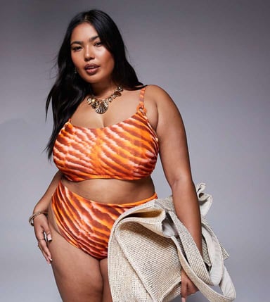 ASOS DESIGN Curve Charlie bikini top with hidden underwire in orange animal print