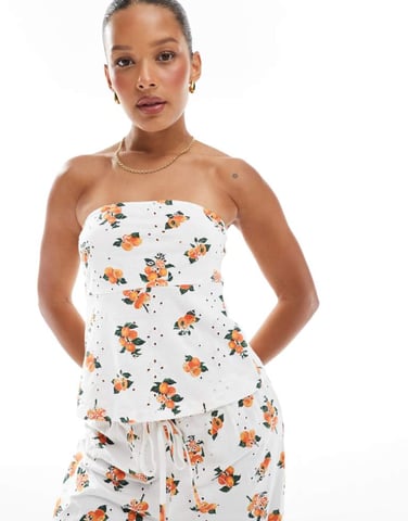ASOS DESIGN ribbon detail broderie bandeau in white base orange print