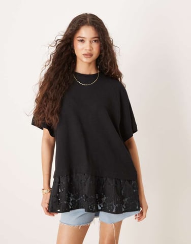 ASOS DESIGN oversized raglan t-shirt with lace hem detail in black