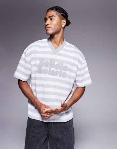 ASOS DESIGN boxy oversized t-shirt with v-neck and text graphic in textured stripe