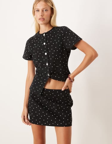 ASOS DESIGN clean denim micro skirt in mini polka dot