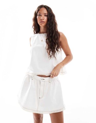 ASOS DESIGN gathered denim micro skirt with broderie trim in ecru
