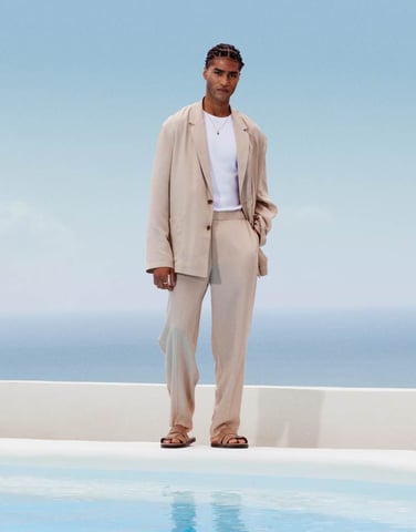 ASOS DESIGN oversized tapered lightweight suit trousers in stone