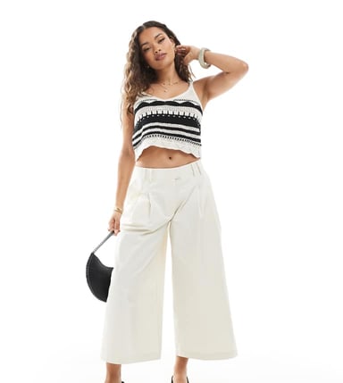 ASOS DESIGN Petite clean cotton cropped wide leg trousers with seam detail in cream