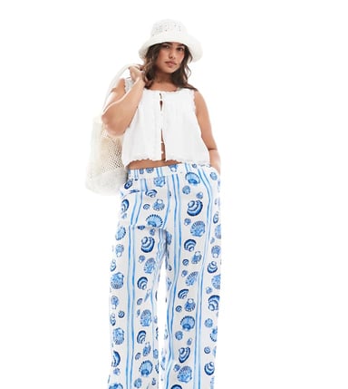 Vero Moda Curve wide leg trousers in blue seashell print