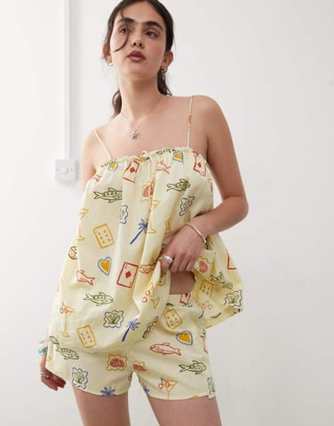 Reclaimed Vintage pull on relaxed beach short in yellow postcard print