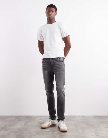 ASOS DESIGN skinny jeans in washed black