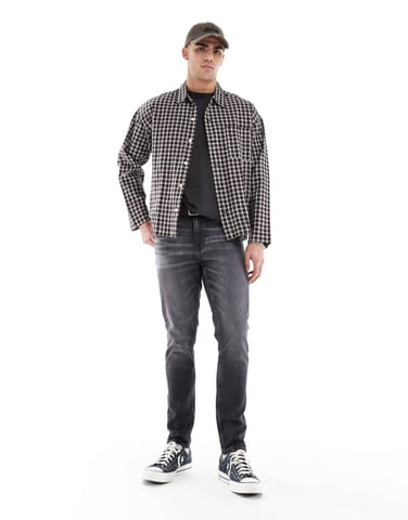 ASOS DESIGN skinny jeans in washed black