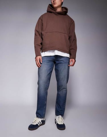 ASOS DESIGN tapered fit jeans in dark wash blue