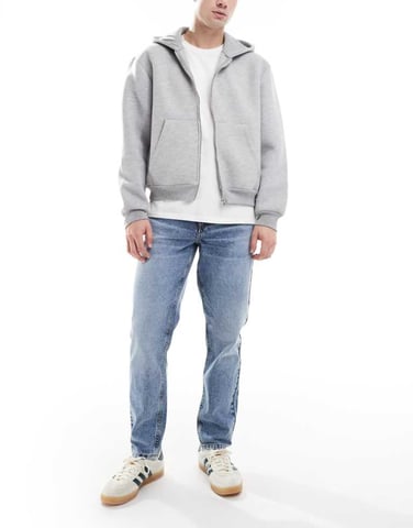 ASOS DESIGN tapered jeans in mid wash blue