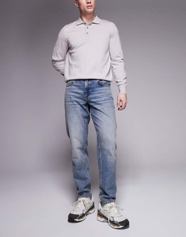 ASOS DESIGN tapered fit jeans in mid wash blue
