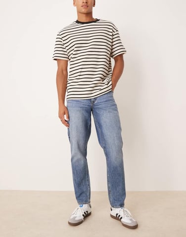 ASOS DESIGN tapered fit jeans in mid wash blue