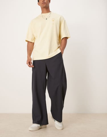 ASOS DESIGN twisted horseshoe trouser in black