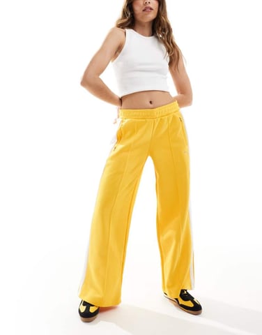 Puma T7 low rise track trousers in yellow