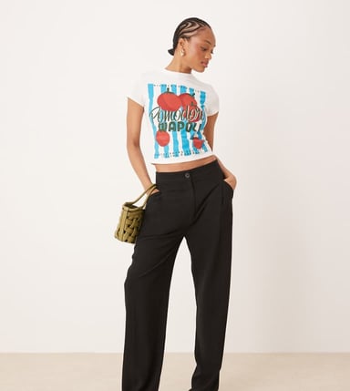 ASOS DESIGN Tall pleat front tapered trousers with linen in black