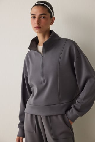 Större halvcollared stickad sweatshirt
