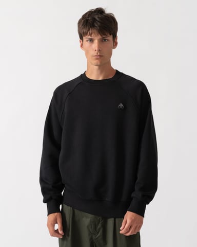 Avslappnad passform långärmad sweatshirt med logodetalj i svart