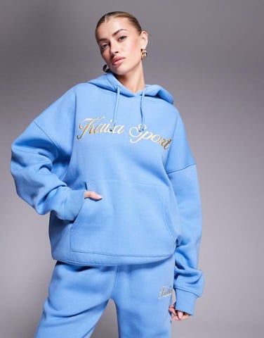 Kaiia cotton blend sport embroidered script logo hoodie co-ord in blue and yellow