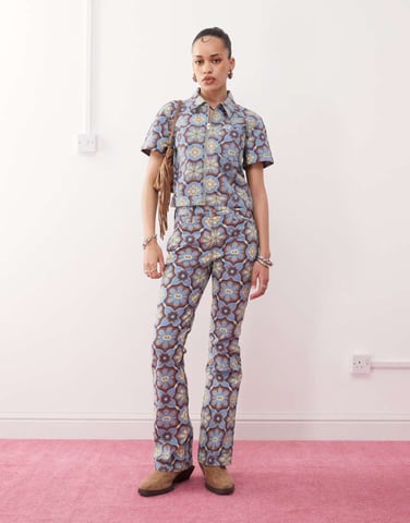 Wrangler co-ord bootcut 70s print jeans in blue