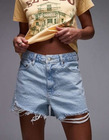 Topshop denim A-line shorts with rip in bleach