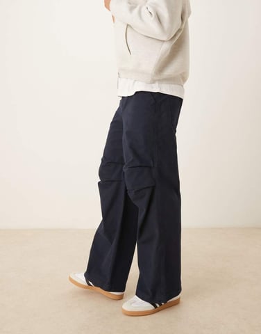 ASOS DESIGN loose trousers with knee pleats in navy