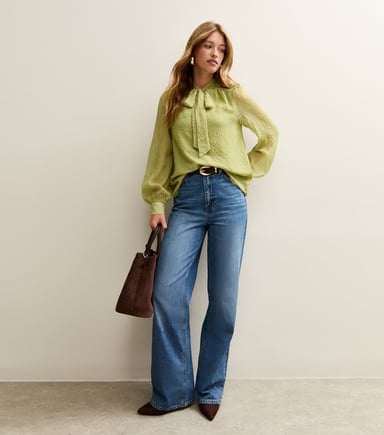 Groene top met strik en lange mouwen