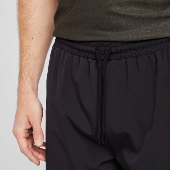 North Ridge Men's 7" Run Shorts with Adjustable Waistband and Internal Mesh Brief