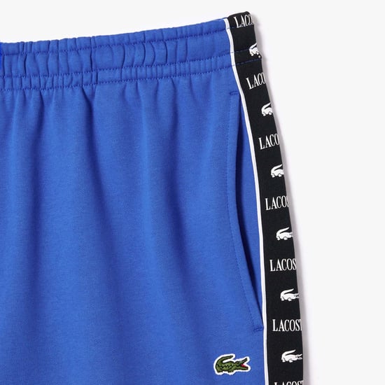 Men's Lacoste Logo Stripe Fleece Jogger Shorts in Blue