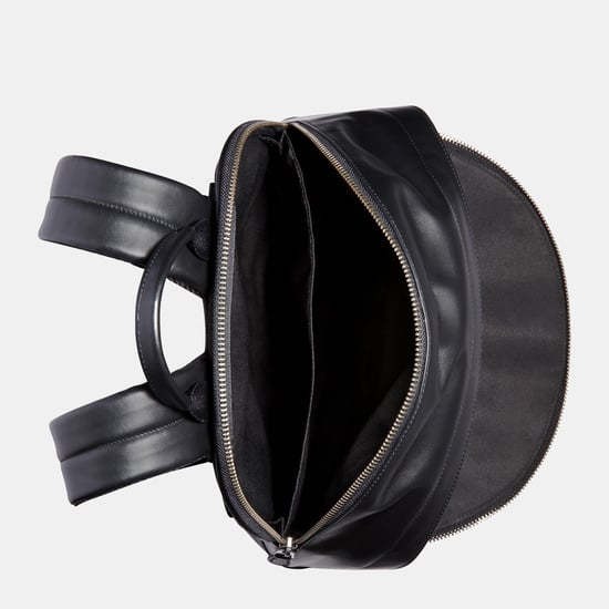 West Backpack in Signature Bag
