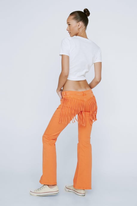 Petite Fringed Low Rise Flared Denim Jeans