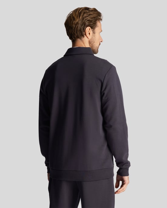 Lyle & Scott Herr Golftröja med LS-logotyp och 1/4-dragkedja i marinblått - Image 3