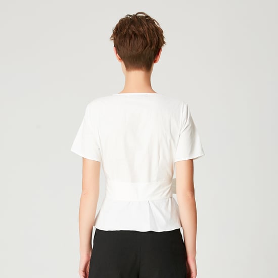 Peplum top with wide bow belt