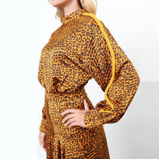 Blus i leopardmönster och ärmar med tofsar - Image 4