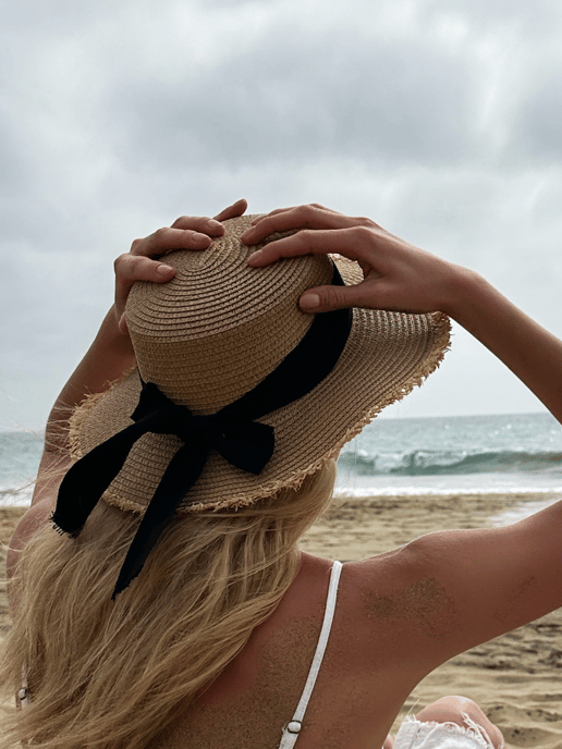 Straw Hat With Black Ribbon Bow