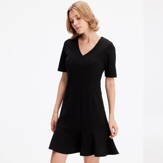 Minimalistische trapeze jerseyjurk - Image 3
