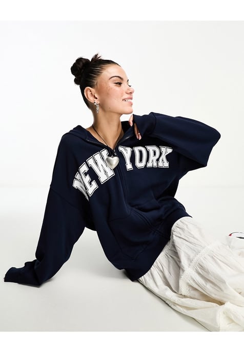 ASOS DESIGN zip through hoodie with new york graphic in navy - Image 1