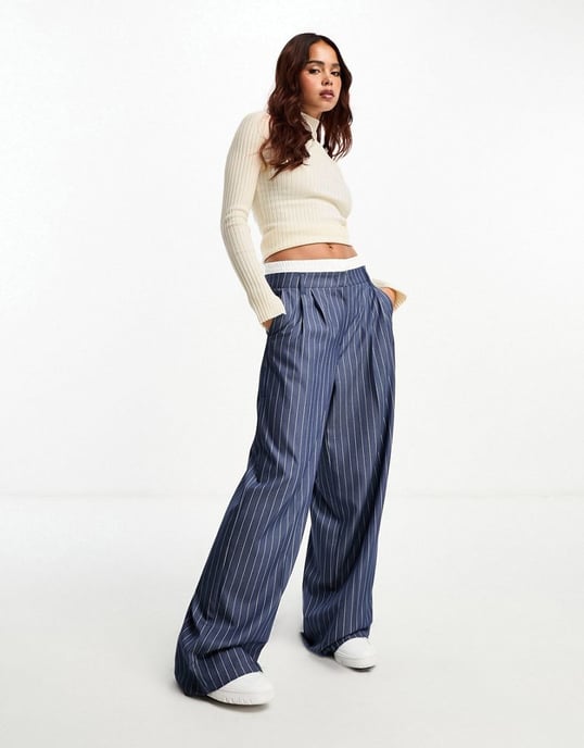 ASOS DESIGN high neck jumper in rib in cream-White