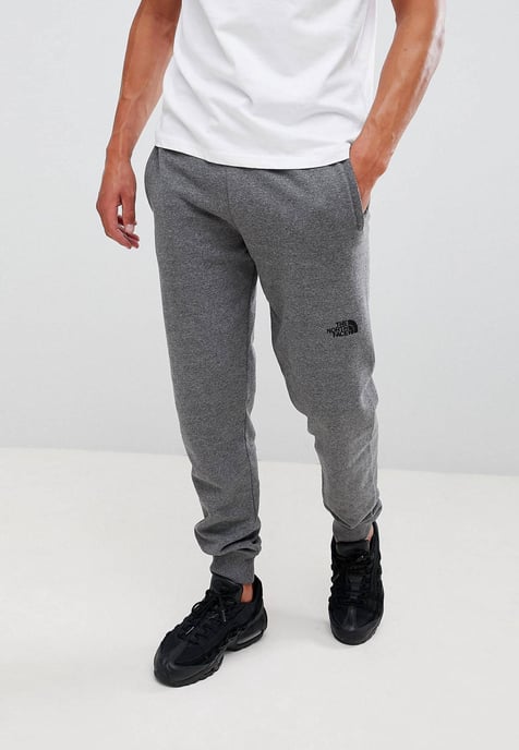 The North Face NSE Heren Fleece Cuffed Joggers Pant Grijs - Image 1